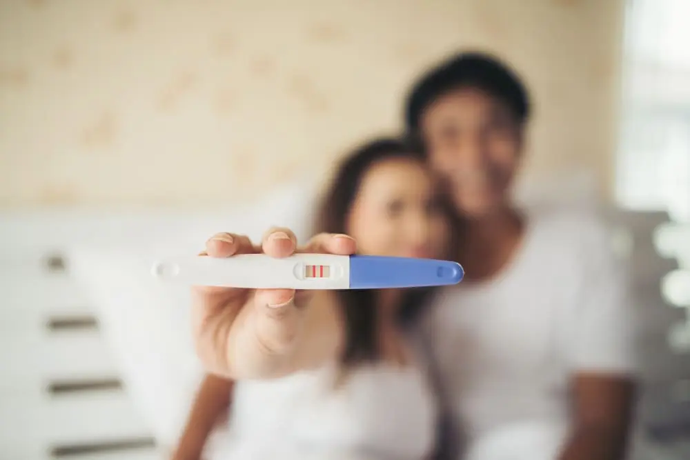 top-view-positive-pregnancy-tests-arrangement